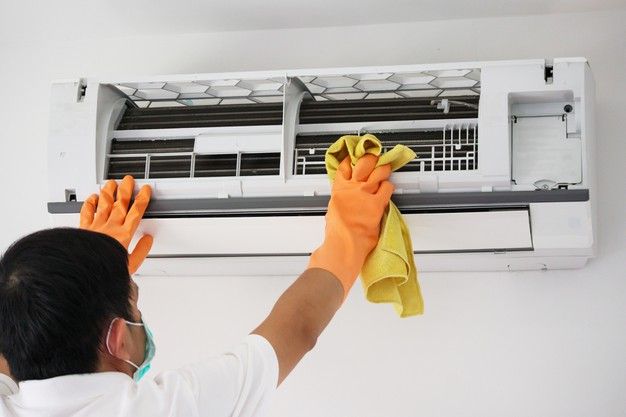 Our team working on AC installation
